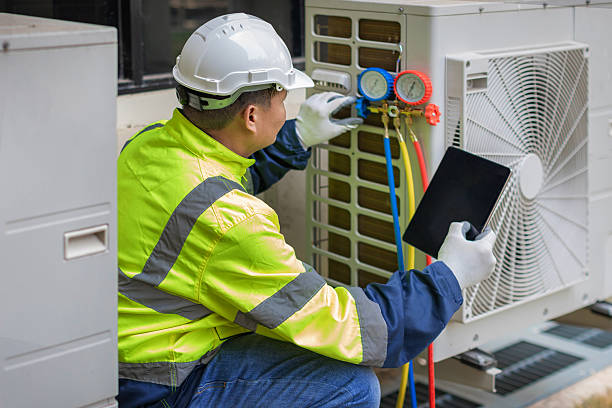 Professional Ac Installation technician working in Woodville, WI